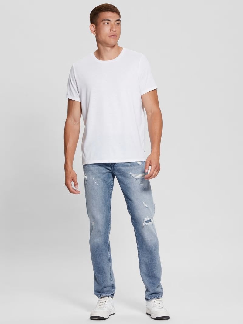 Guess Eco Rip-and-Repair Tapered Jeans - Jet Stream Guess Eco Rip-and-Repair Tapered Jeans - Jet Stream