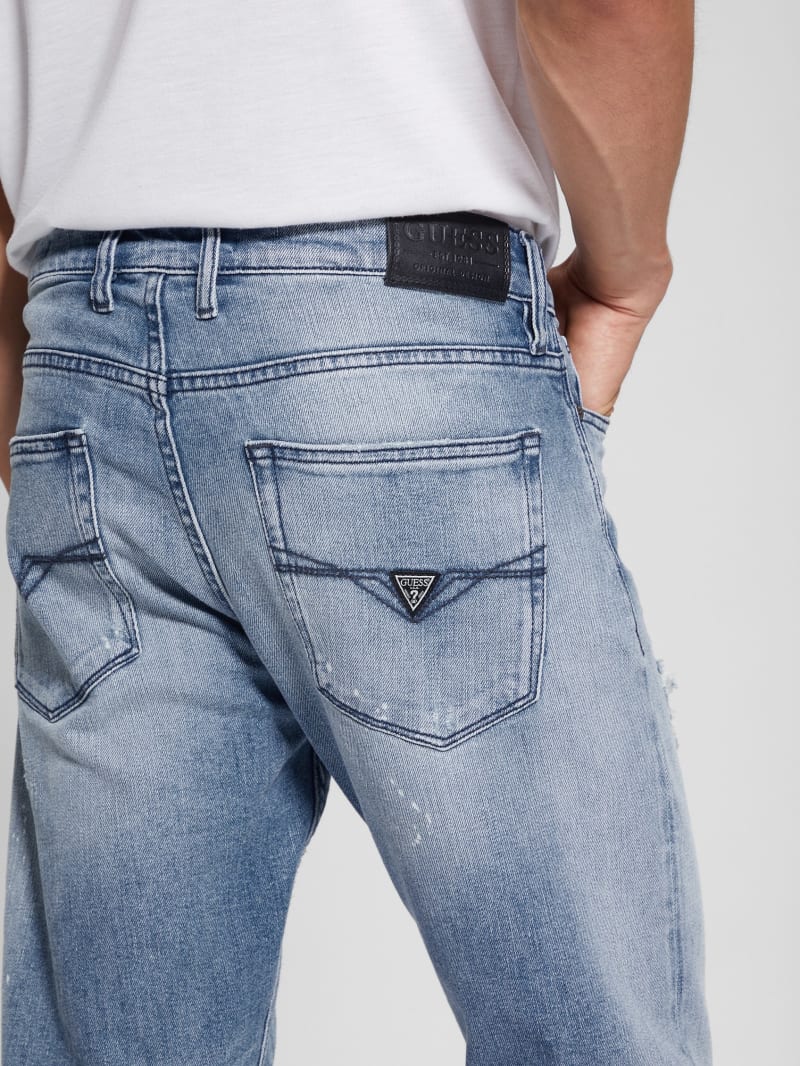 Guess Eco Rip-and-Repair Tapered Jeans - Jet Stream Guess Eco Rip-and-Repair Tapered Jeans - Jet Stream
