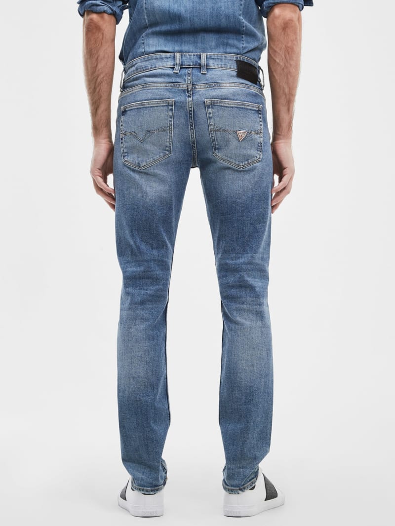 Guess Distressed Tapered Jeans - Light Tide Wash Guess Distressed Tapered Jeans - Light Tide Wash