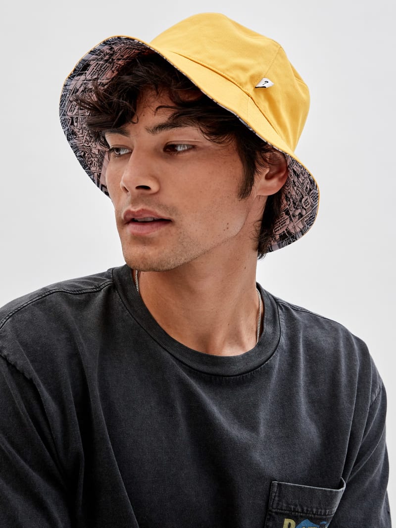 Guess GUESS Originals x Batman Reversible Bucket Hat - Pure White Multi Guess GUESS Originals x Batman Reversible Bucket Hat - Pure White Multi